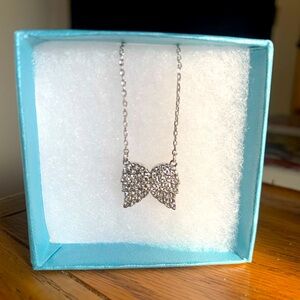 Touchstone Crystal by Swarovski angel wings necklace with box